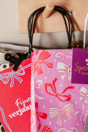 Roze papieren tas met strikjes - rood/roze - 26x35cm - giftbag