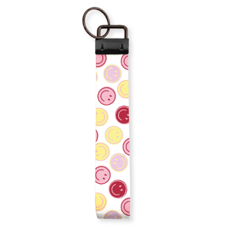 Witte stoffen polssleutelhanger - Met gele, lila en roze smileys